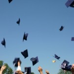 students-throwing-hats-graduation