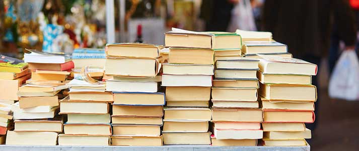 Books for sale on market stall