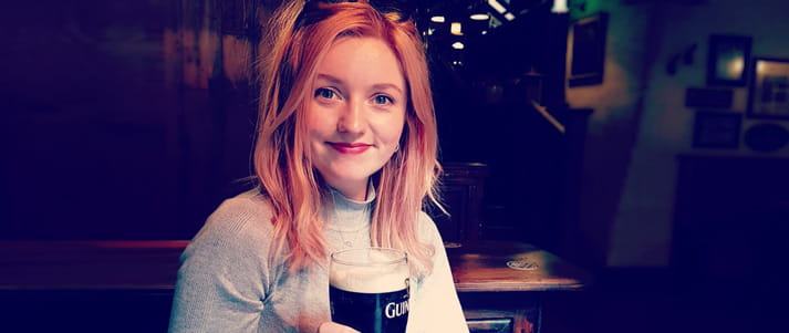 Chelsea Dickenson in Dublin with pint of Guinness