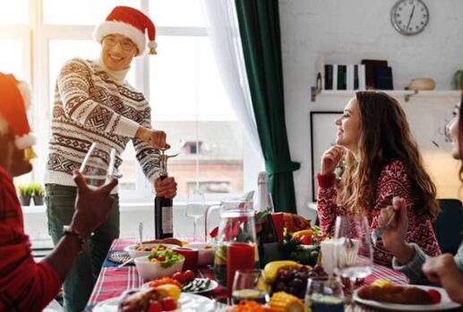 Friends sharing a Christmas dinner