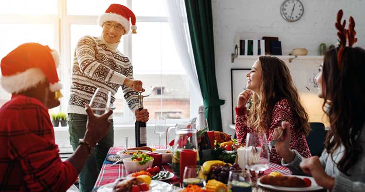 Friends sharing a Christmas dinner