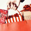 hand holding bag of presents