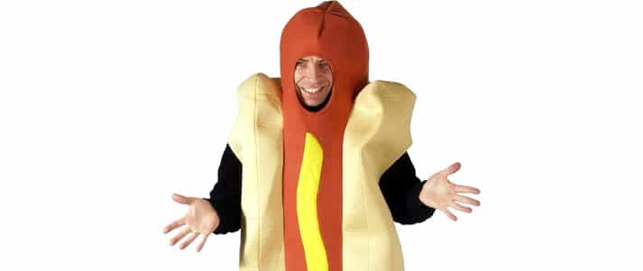 A man wearing a hot dog fancy dress costume