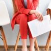 Woman waiting for interview with her resume