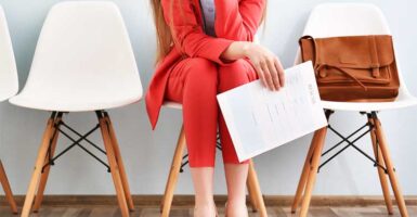 Woman waiting for interview with her resume