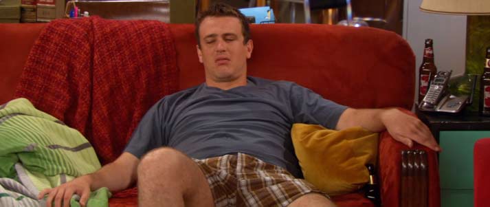 marshal from how I met your mother sitting on the sofa in underwear