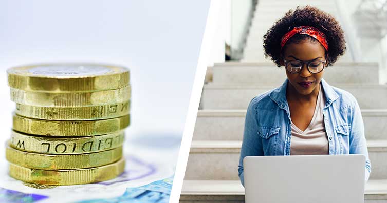 pound coin stack next to woman on laptop