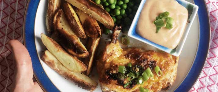 peri peri chicken with chips and peas