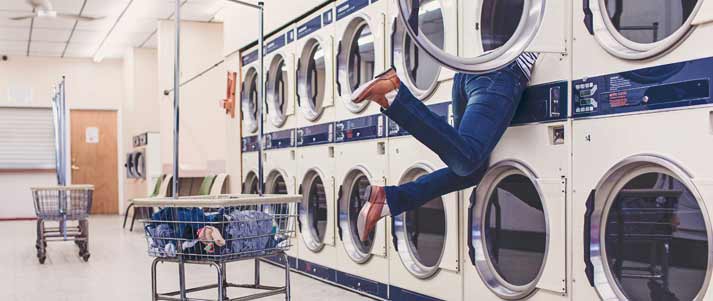 person falling into washing machine