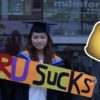 Pok Wong protesting at Anglia Ruskin University graduation