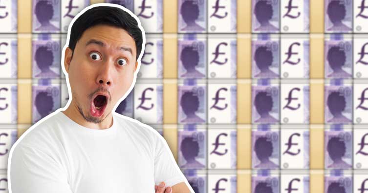 shocked man in front of money