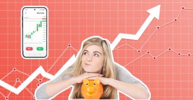 Girl with piggy bank with mobile phone showing stock exchange and financial arrow in background