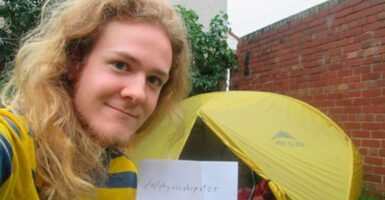 student lives in tent save on rent