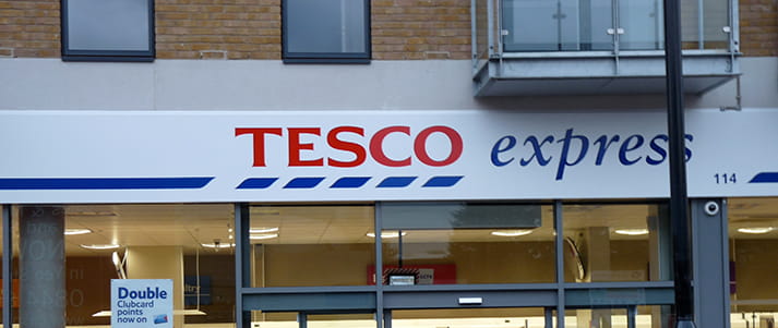 tesco apologise for late card charge