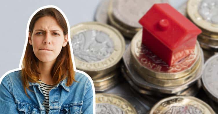 woman thinking next to house on money