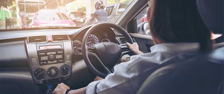 Woman driving uber car