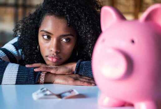 Woman looking worried about money