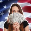 american flag with woman holding money