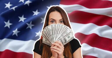 american flag with woman holding money