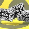 three asos gift cards yellow background