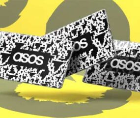 three asos gift cards yellow background