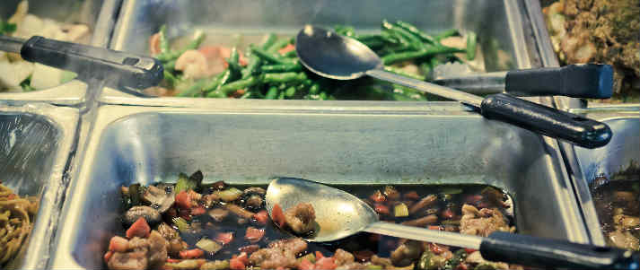 buffet trays with different foods