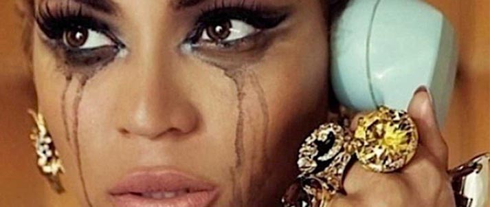 Beyonce on the phone crying