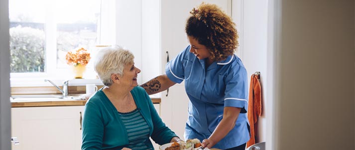 care worker with older woman