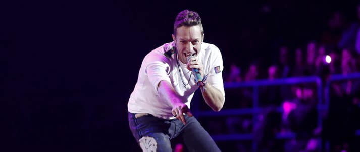 chris martin on stage