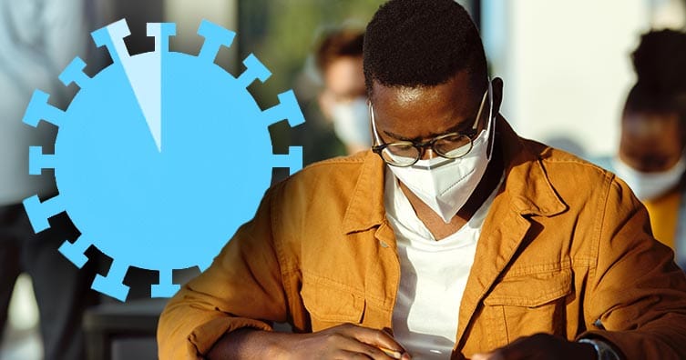 man with mask studying with coronavirus symbol