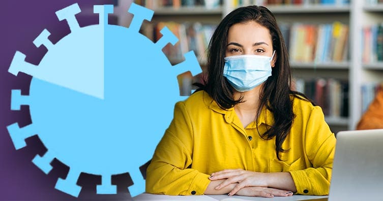 Woman at desk wearing face mask with chart in the shape of the coronavirus virus