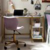 student bedroom with desk and chair next to bed