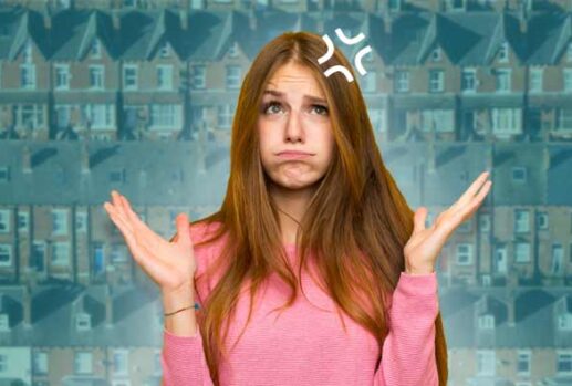 frustrated woman in front of terrace houses