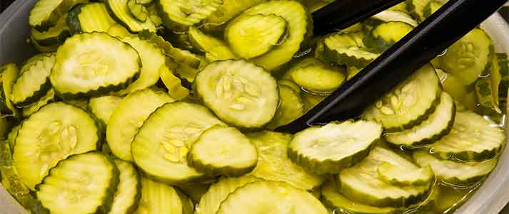 tongs in gherkins and pickles