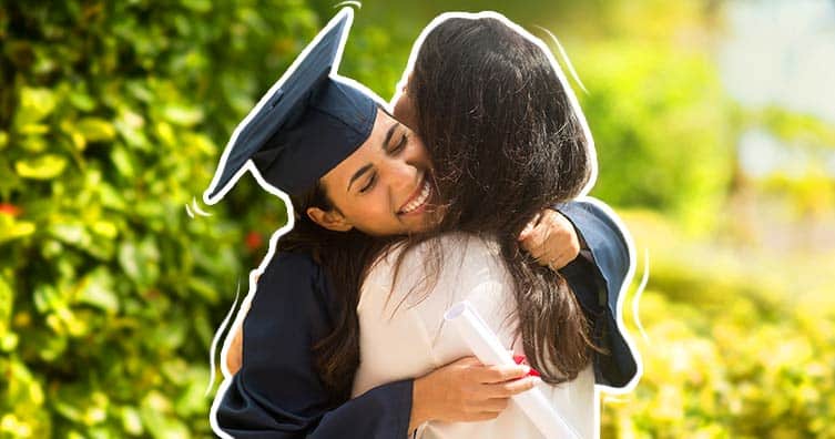 Graduate hugging mother