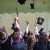 graduate students throwing hats