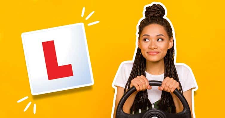 learner driver plate and woman with steering wheel