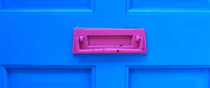 Blue door pink letterbox