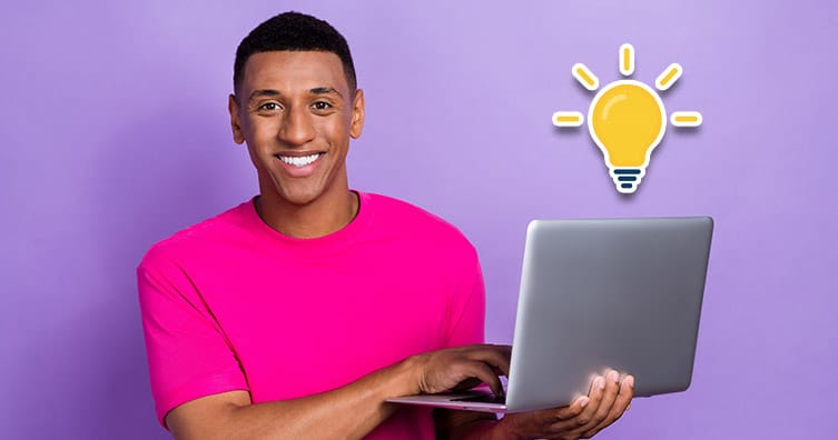 Man with laptop and lightbulb