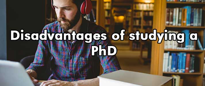 man studying with text reading 'Disadvantages of studying a PhD'