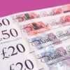 uk money notes against pink background