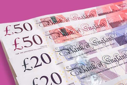 uk money notes against pink background