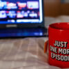 netflix cup and laptop