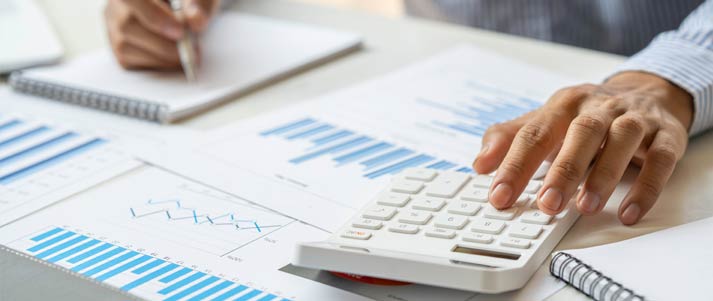 table with charts and a calculator