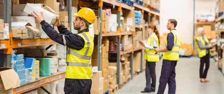 people working in a warehouse