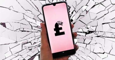 phone with broken pound sign with shattered mirror background