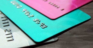 Credit cards laid out on wooden floor