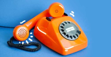 Orange retro phone off the hook