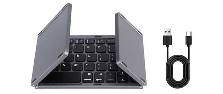 A silver folding keyboard and a black cable