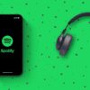 spotify-iphone-and-headphones-on-a-green-background